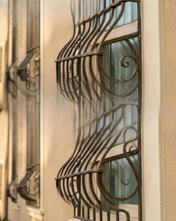 Why Some Window Grilles Feature a Curved Bottom: The Practical and Aesthetic Reasons Explained