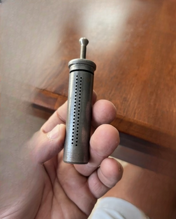 Unlocking the Story Behind a Mysterious Retro Device: The Vintage 10-Cent Coin Bank
