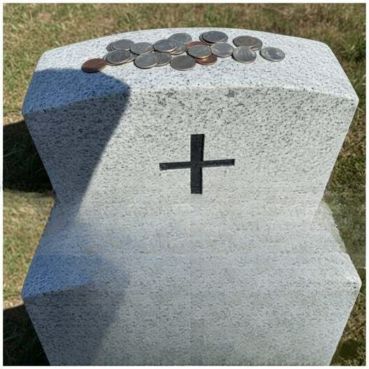 The Meaning Behind Coins Left on Military Headstones: A Tradition of Remembrance and Respect