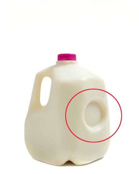 The Hidden Purpose of the Circular Dent on Plastic Milk Jugs
