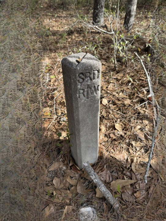 The Small Concrete Marker Beside the Trail: A Quiet Clue to a Forgotten Road and Local History