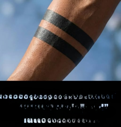 The Meaning Behind Black Band Tattoos: Why This Minimalist Trend Carries Deep Personal Symbolism