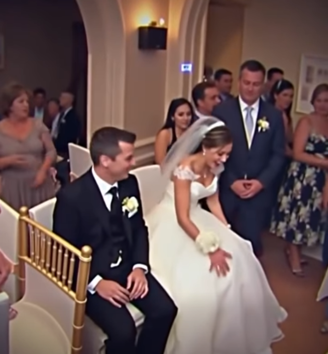 During the Wedding Ceremony, Something Suddenly Moved Beneath the Bride’s Dress — Moments Later, the Entire Room Was Left Completely Speechless